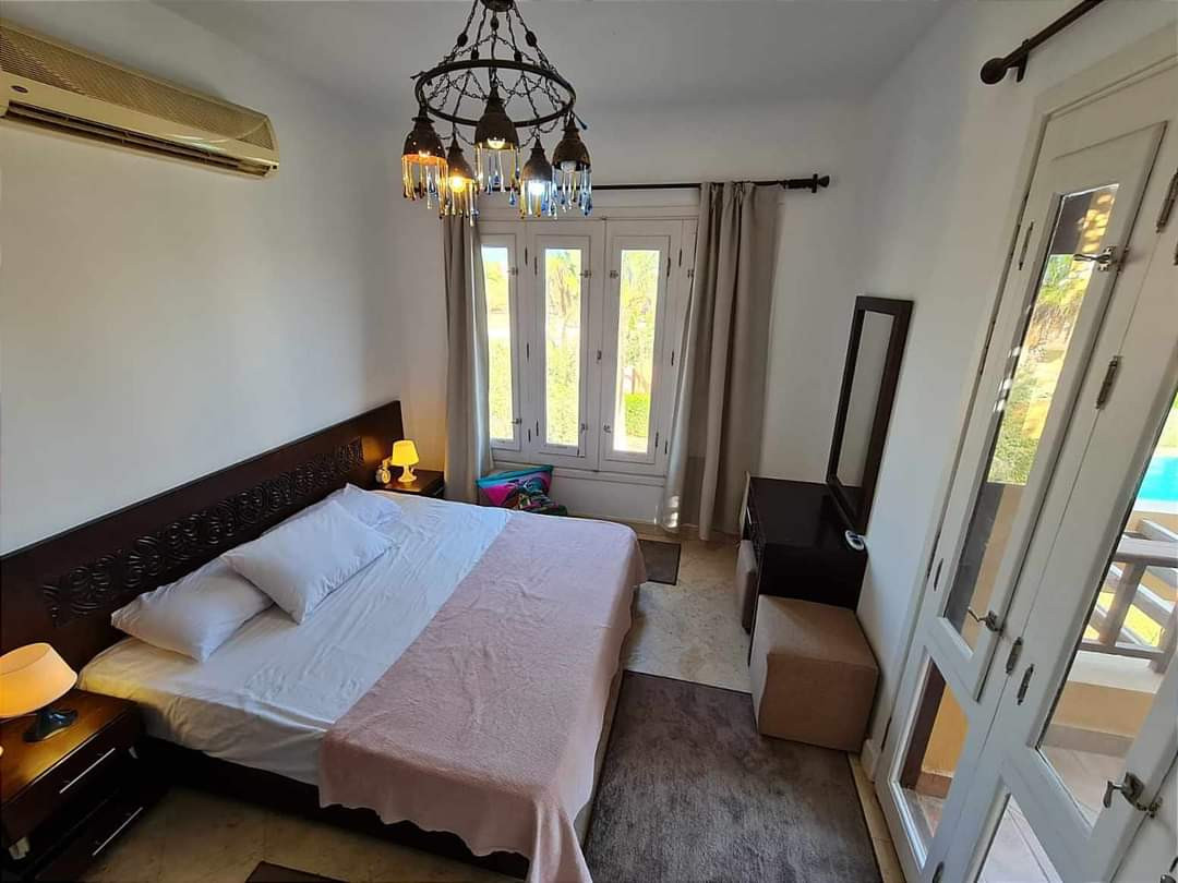 Renzo -   One bedroom apartment with a big terrace and pool view in Gouna