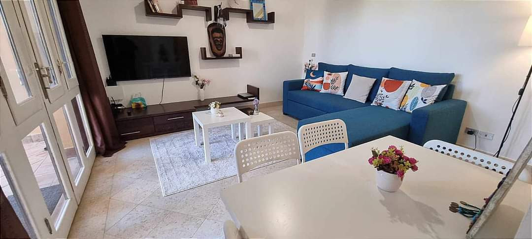 Renzo -   One bedroom apartment with a big terrace and pool view in Gouna