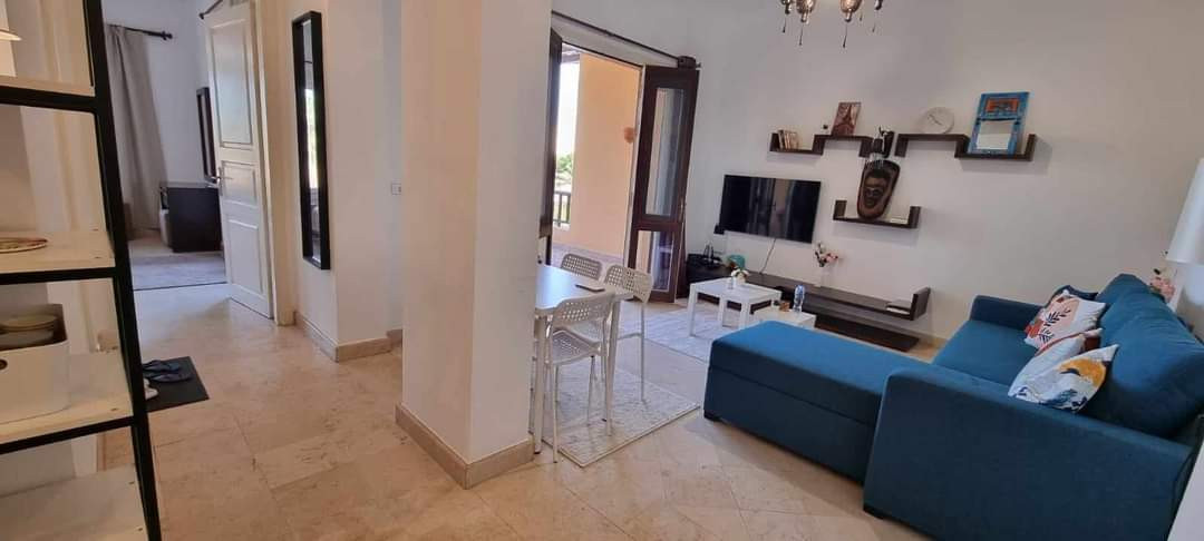 Renzo -   One bedroom apartment with a big terrace and pool view in Gouna