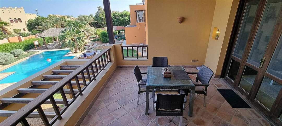 Renzo -   One bedroom apartment with a big terrace and pool view in Gouna