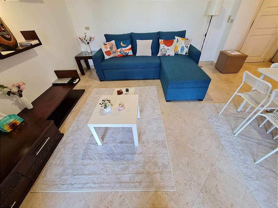 Renzo -   One bedroom apartment with a big terrace and pool view in Gouna