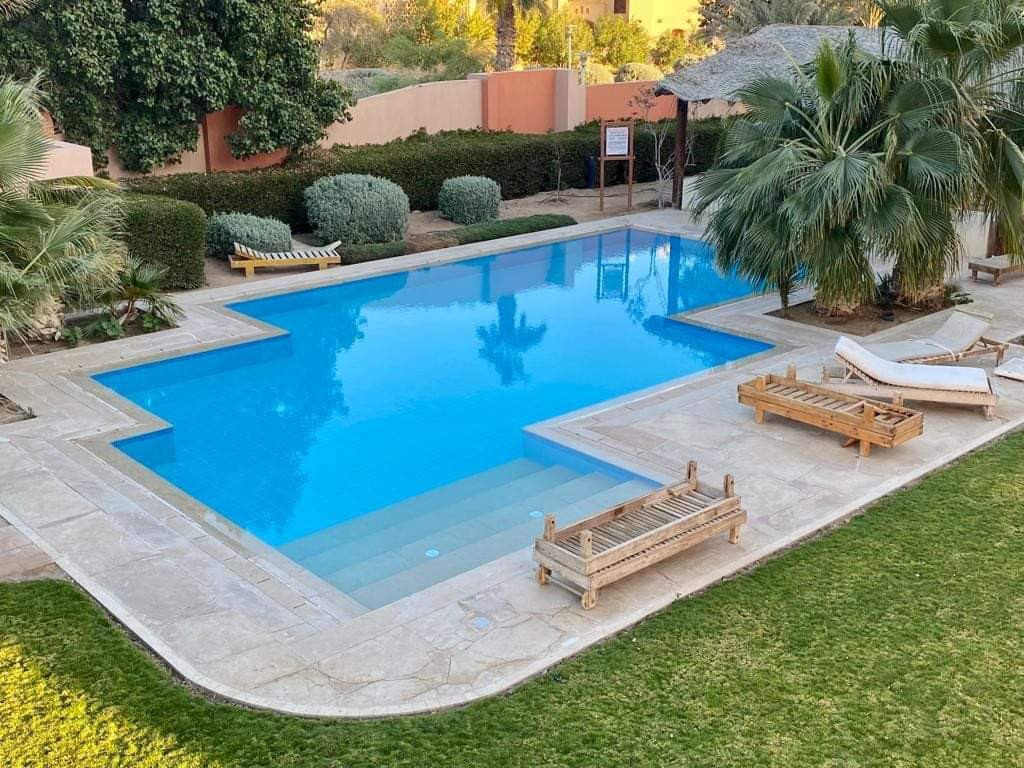 Renzo -   One bedroom apartment with a big terrace and pool view in Gouna